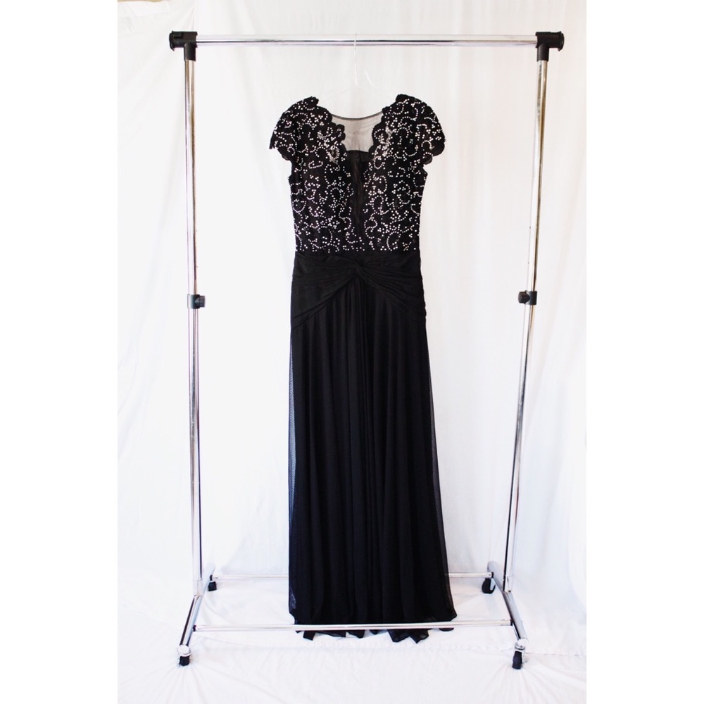 Black sequined prom dress.